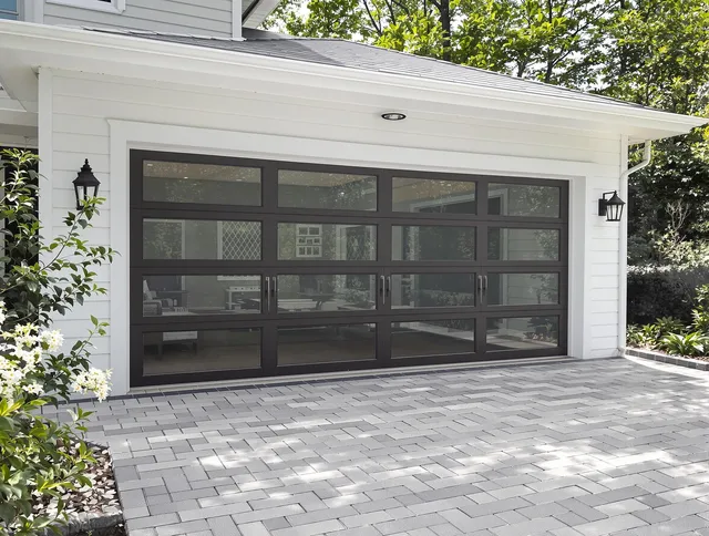 Barrington Garage Door Repair design specialist presenting custom garage door options to Barrington homeowner