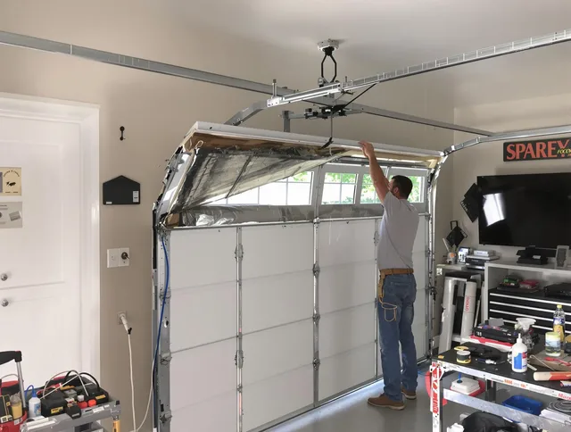 Garage door section replacement by Barrington Garage Door Repair in Barrington