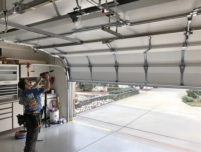 Garage door track repair service by Barrington Garage Door Repair in Barrington